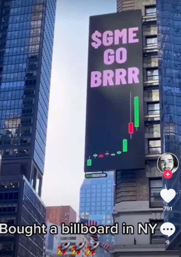 picture of a billboard in NY that says "$GME GO BRRR"